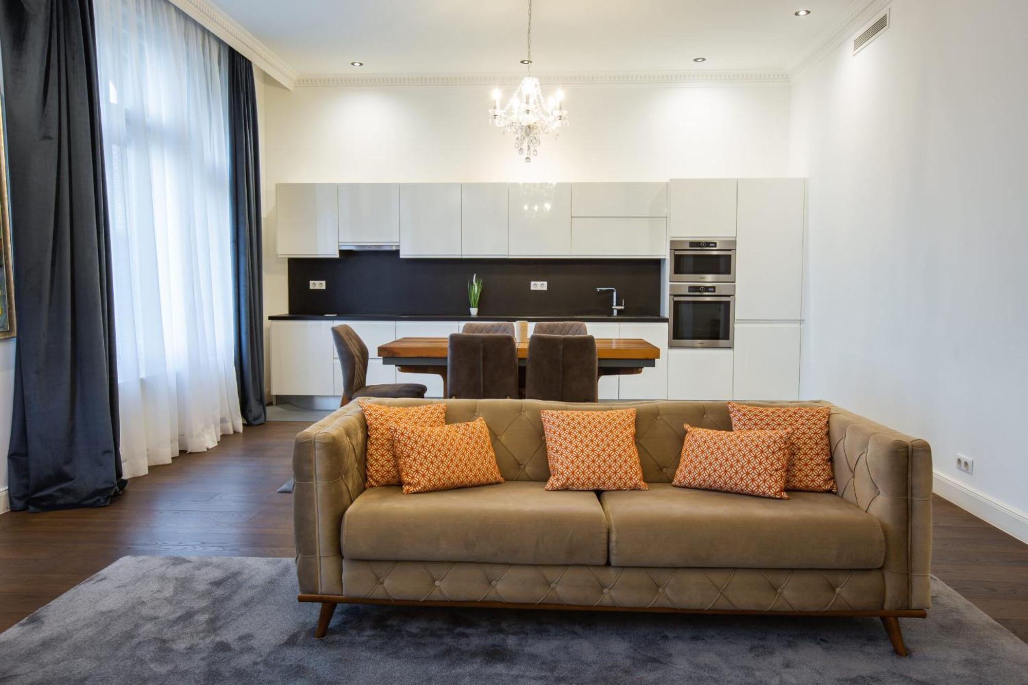 Zoya Luxury Residence Βουδαπέστη Εξωτερικό φωτογραφία A living room with a sofa